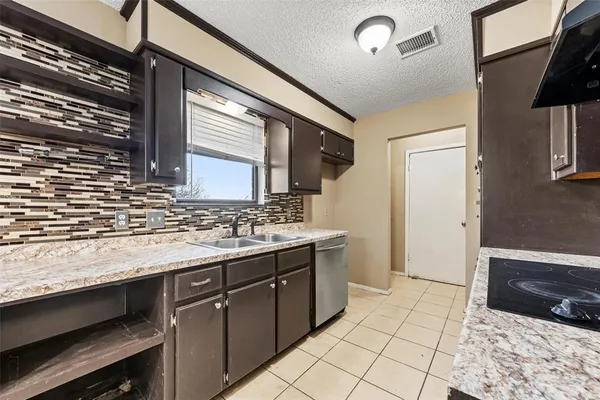 a bathroom with a sink a vanity and a mirror