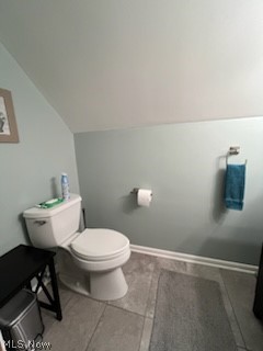 1559 Chelmsford Road Cleveland, OH 44124 - Photo 10 of 29 Bathroom with toilet, tile floors, and lofted ceiling