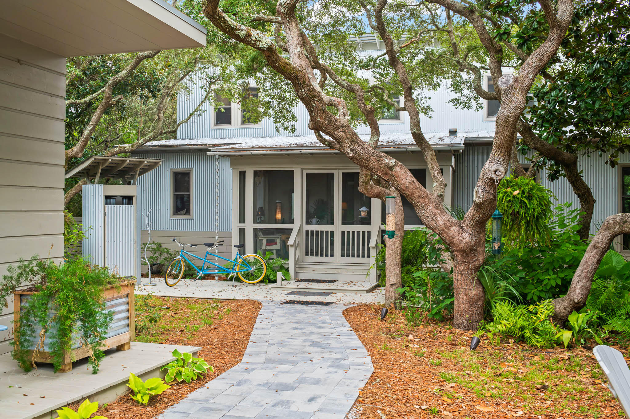 450 Defuniak Street Santa Rosa Beach, FL 32459 - Photo 15 of 75 a front view of a house with a yard
