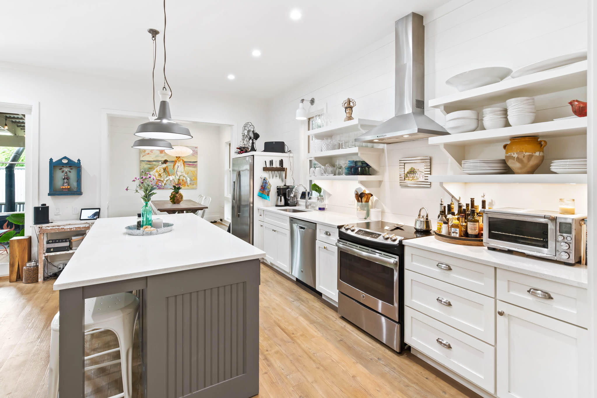 450 Defuniak Street Santa Rosa Beach, FL 32459 - Photo 23 of 75 a kitchen that has a lot of cabinets in it