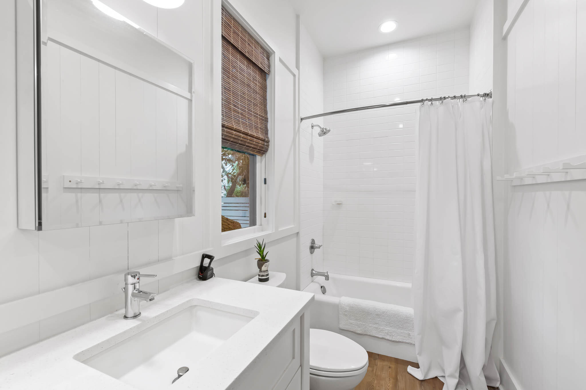 450 Defuniak Street Santa Rosa Beach, FL 32459 - Photo 48 of 75 a bathroom with a sink toilet and shower