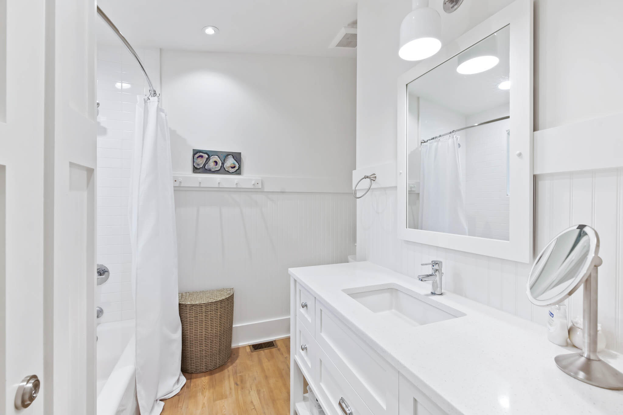 450 Defuniak Street Santa Rosa Beach, FL 32459 - Photo 53 of 75 a bathroom with a sink and a mirror