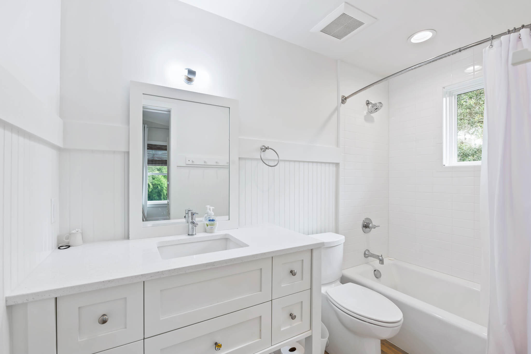 450 Defuniak Street Santa Rosa Beach, FL 32459 - Photo 56 of 75 a bathroom with a sink a toilet and shower