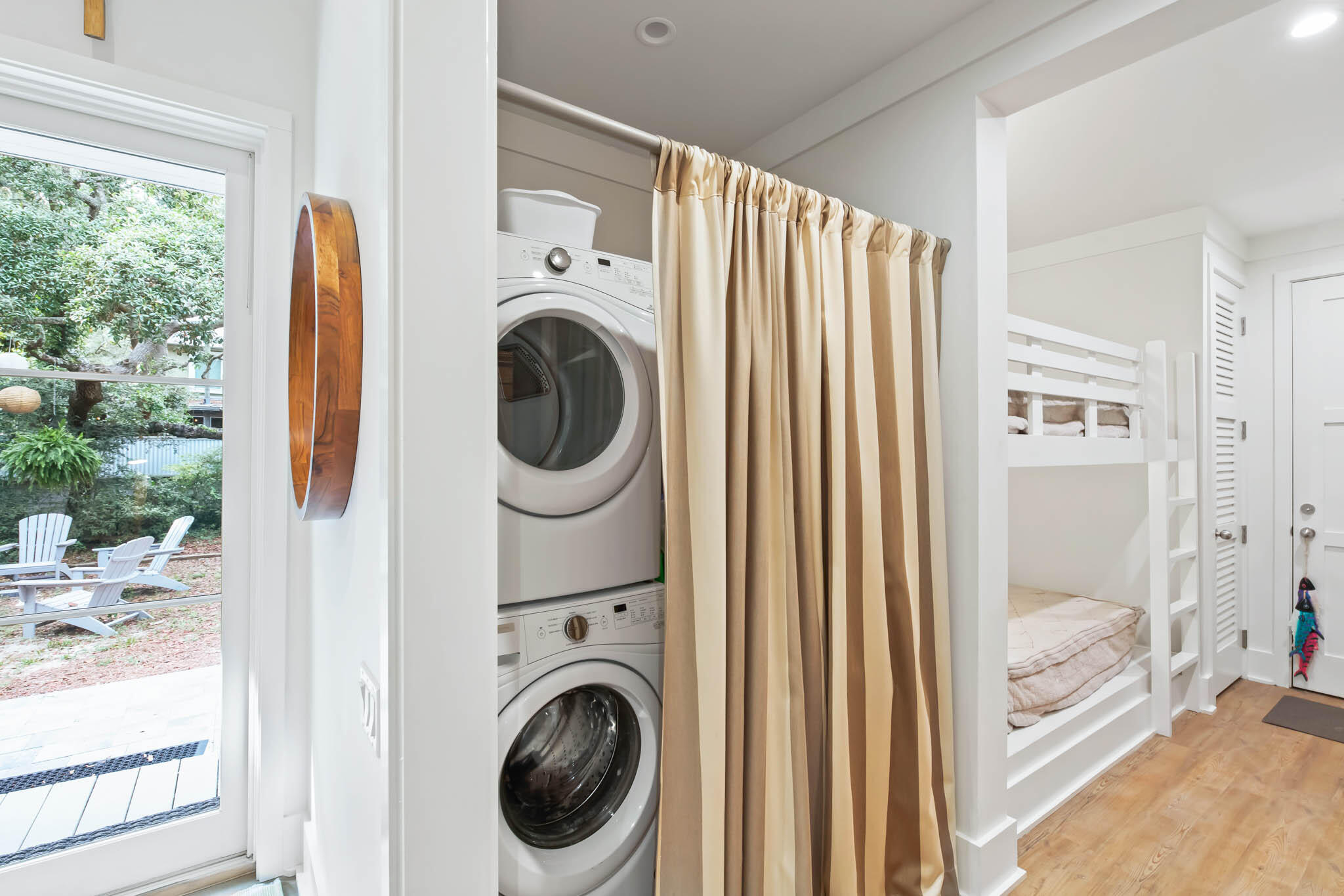450 Defuniak Street Santa Rosa Beach, FL 32459 - Photo 62 of 75 a view of a bedroom with washer and dryer