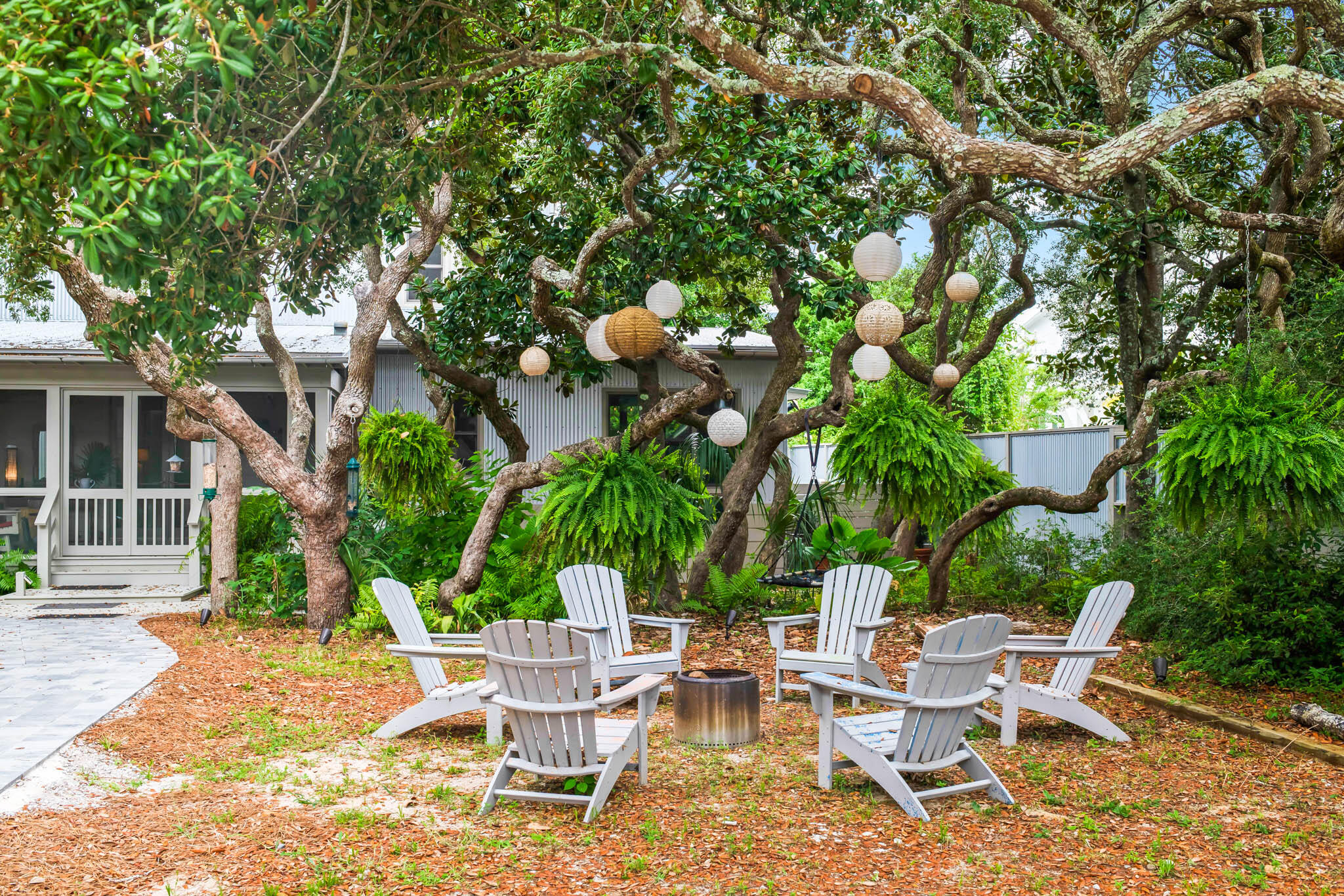 450 Defuniak Street Santa Rosa Beach, FL 32459 - Photo 9 of 75 a view of backyard with sitting area