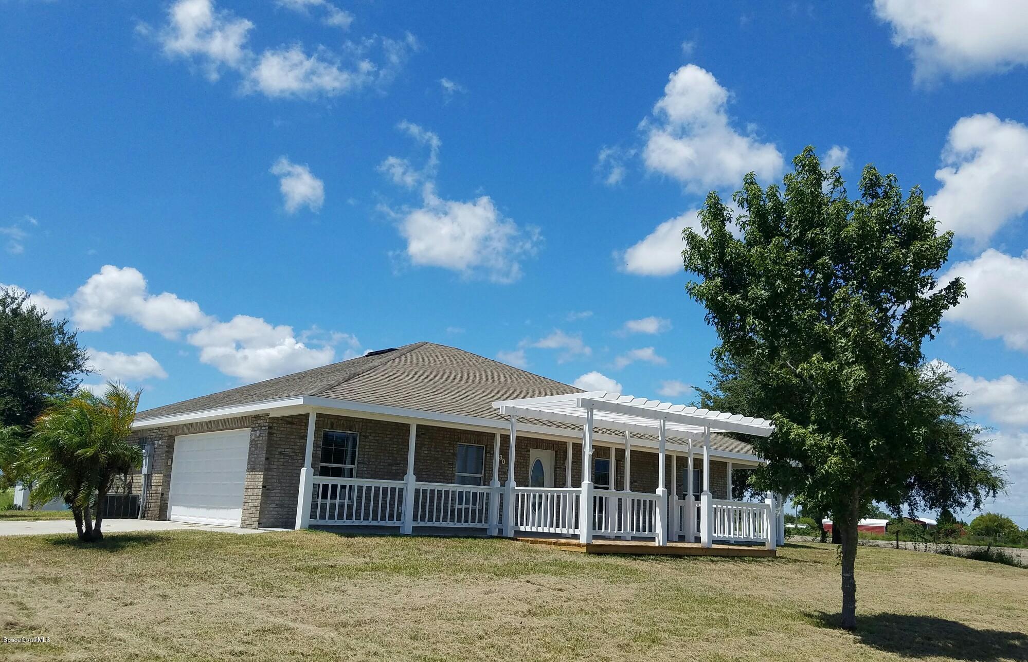 3630 Hammock Road Mims, FL 32754 - Photo 1 of 32 front