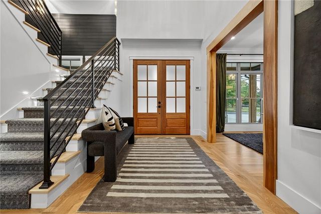 a view of a living room and hardwood floor