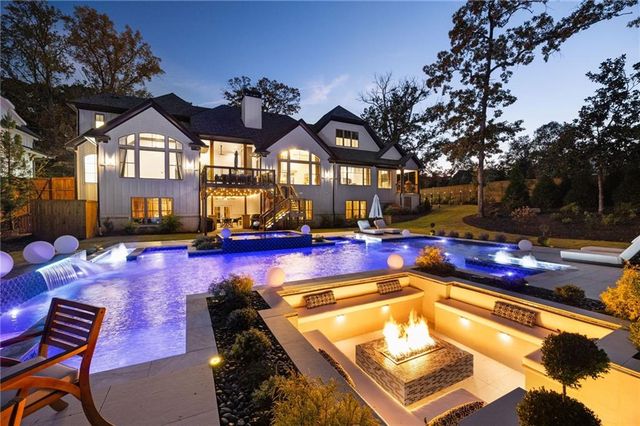 a front view of a house with a ocean view