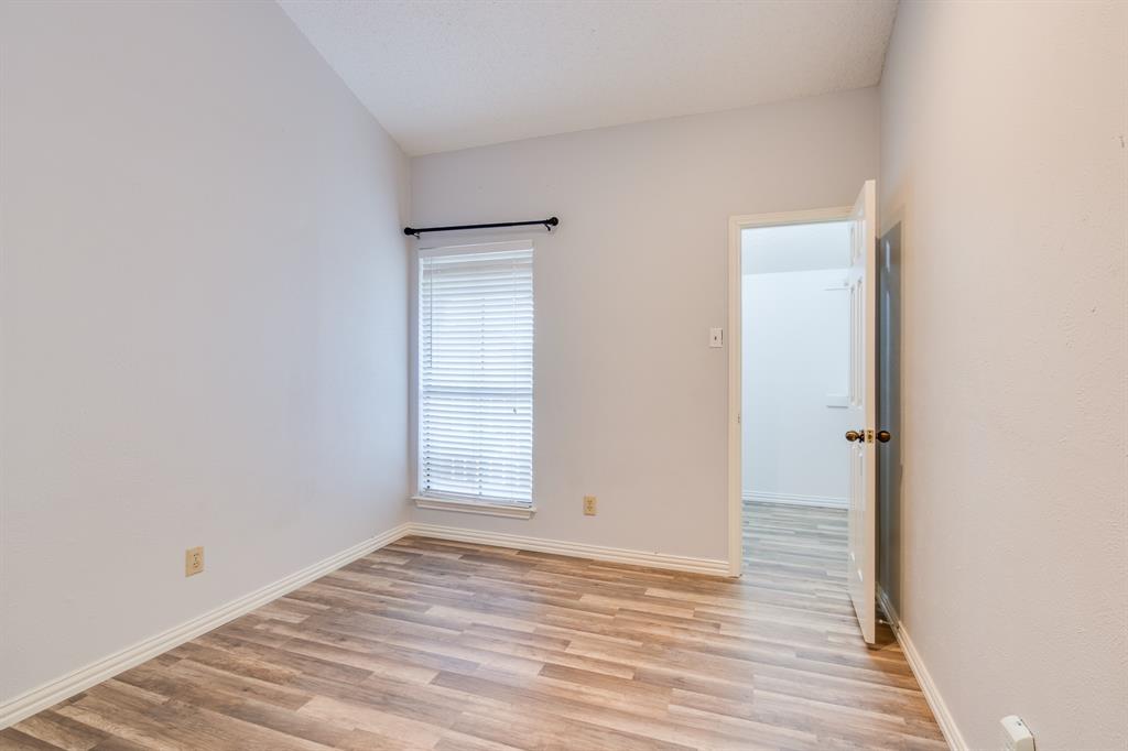2100 Randy Snow Road, Unit 412 Arlington, TX 76011 - Photo 24 of 32 a view of empty room with wooden floor