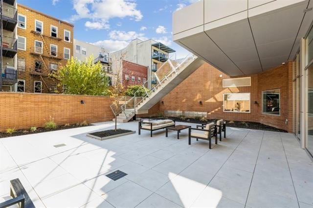 401 Jackson Street, Unit 503 Hoboken, NJ 07030 - Photo 27 of 29 a view of outdoor space with seating area