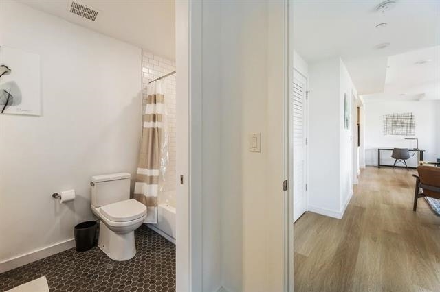 401 Jackson Street, Unit 503 Hoboken, NJ 07030 - Photo 8 of 29 a bathroom with a toilet and a shower