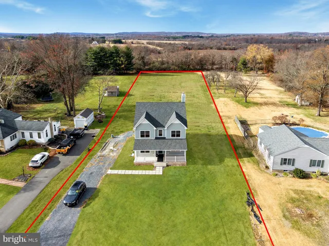 swimming pool view with a lake view