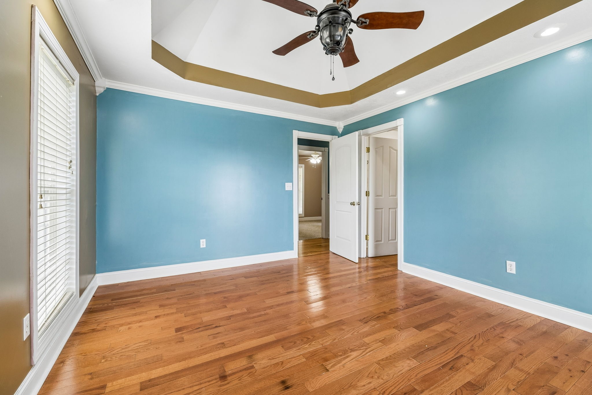 6701 McCormick Ridge Road Whitleyville, TN 38588 - Photo 28 of 63 a view of an empty room with a window and a ceiling fan