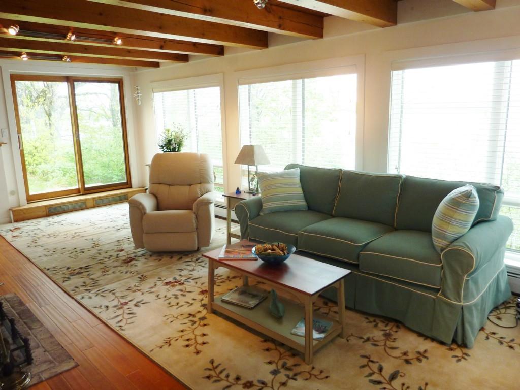 331 Mills / 215 Route North Newcastle, ME 04553 - Photo 10 of 24 Living room, lower level. Small deck...