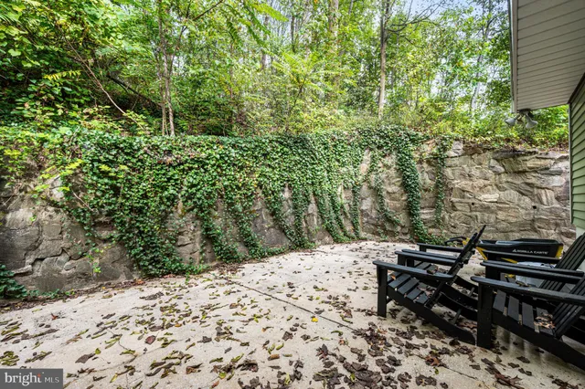 a view of a backyard of the house