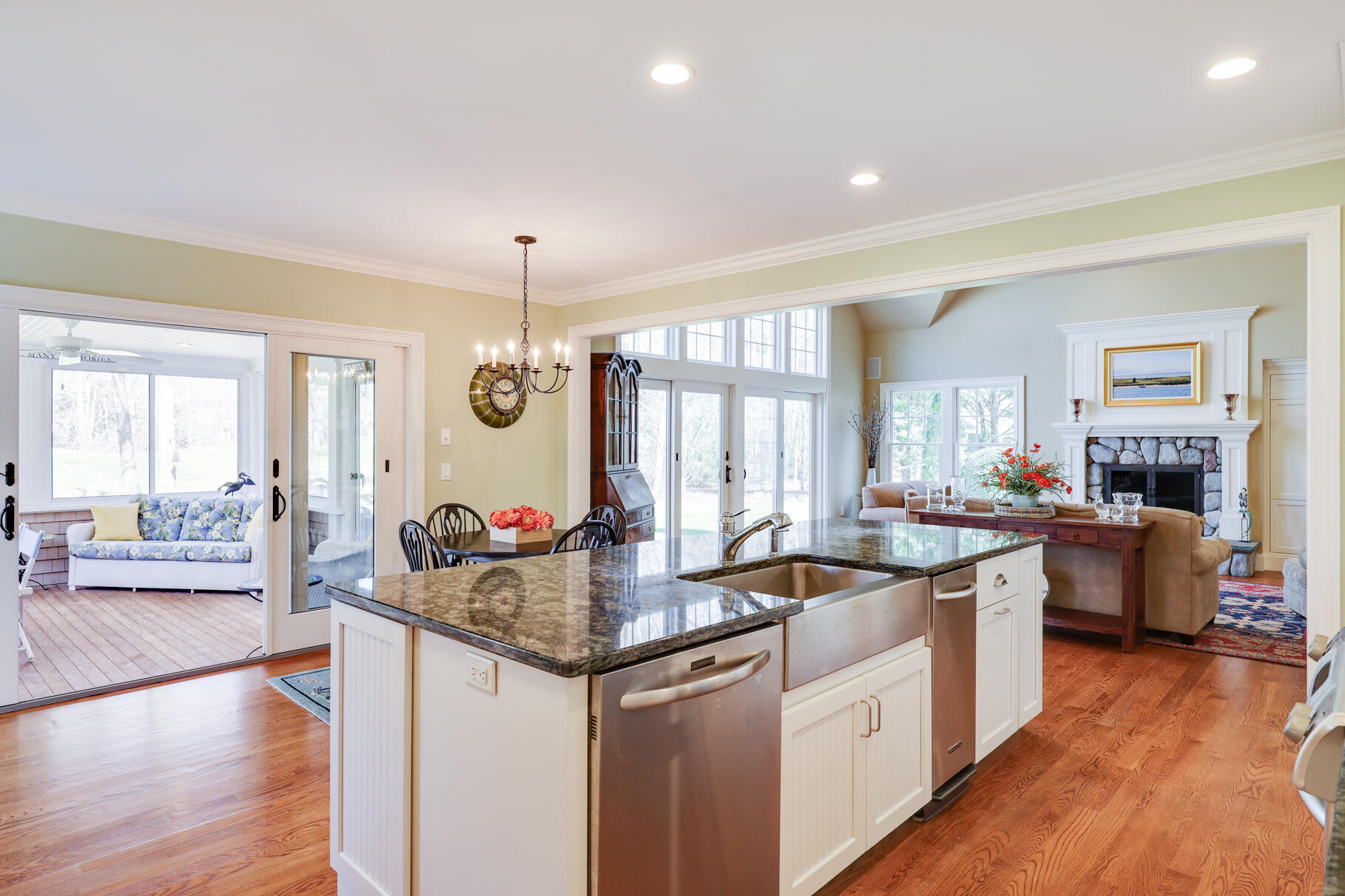 40 Reflection Drive Sandwich, MA 02563 - Photo 12 of 59 a kitchen with sink stove and wooden floor