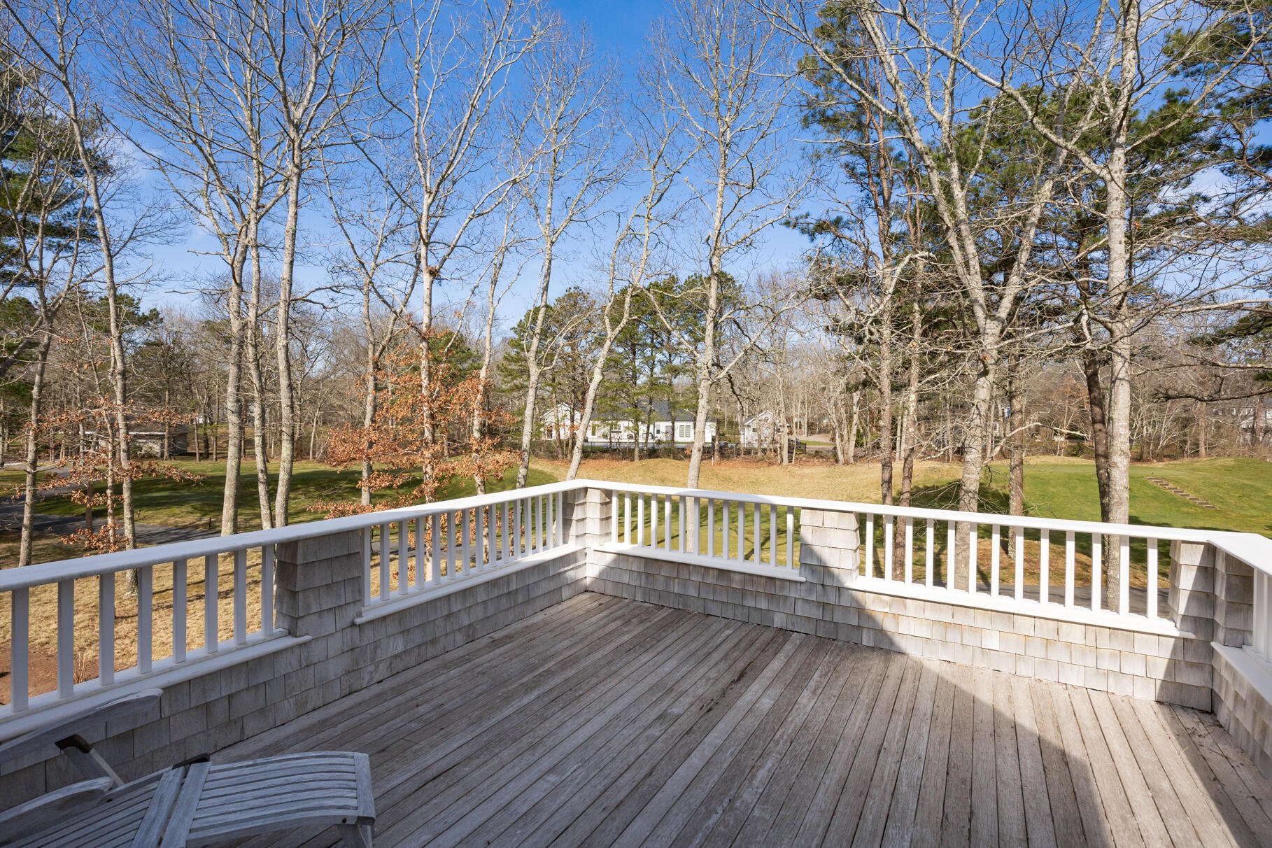 40 Reflection Drive Sandwich, MA 02563 - Photo 32 of 59 a view of a balcony with wooden floor