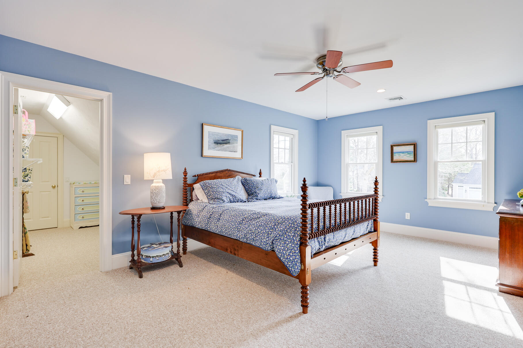 40 Reflection Drive Sandwich, MA 02563 - Photo 37 of 59 a bed room with a bed and a chandelier