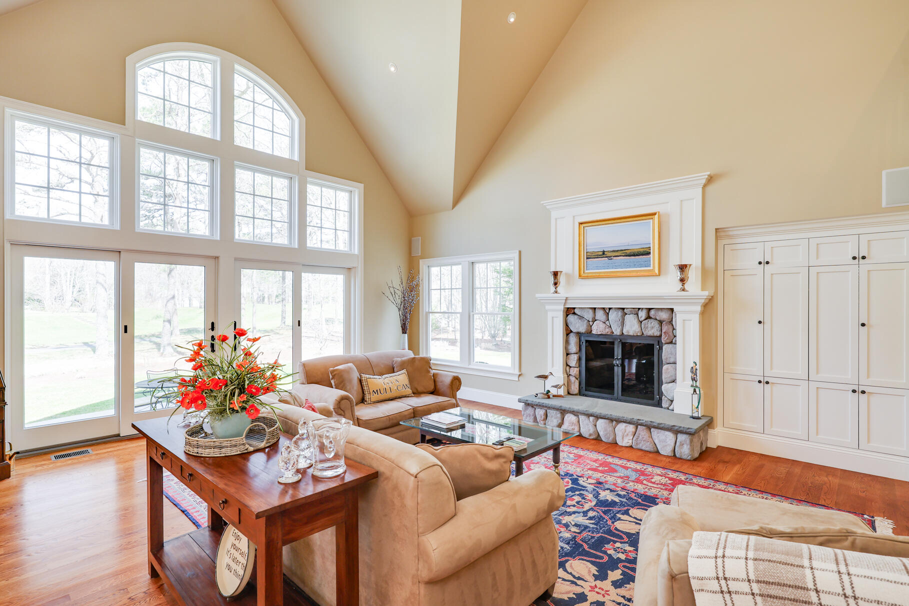 40 Reflection Drive Sandwich, MA 02563 - Photo 4 of 59 a living room with furniture and a fireplace