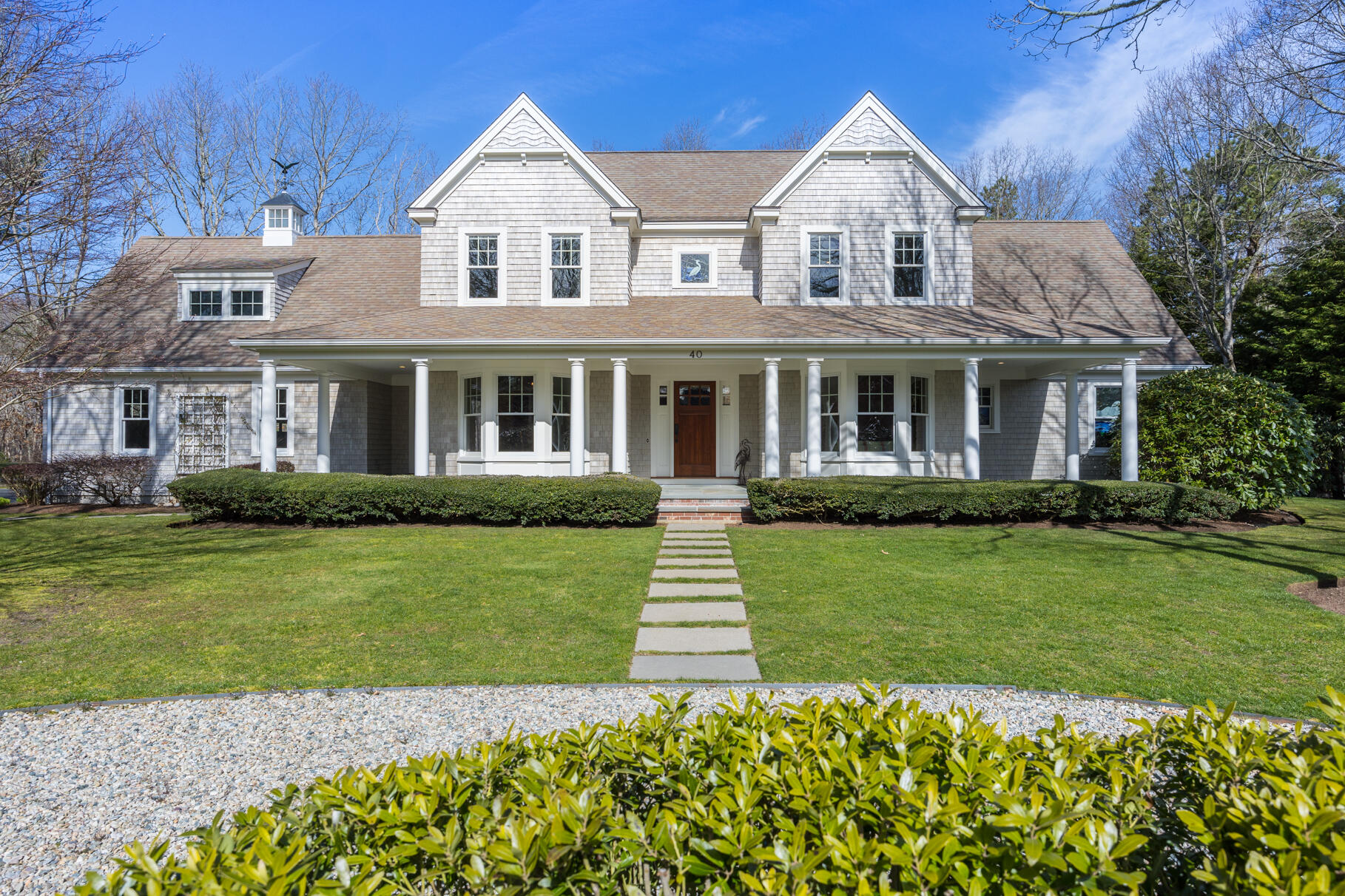 40 Reflection Drive Sandwich, MA 02563 - Photo 53 of 59 a front view of a house with a garden and yard
