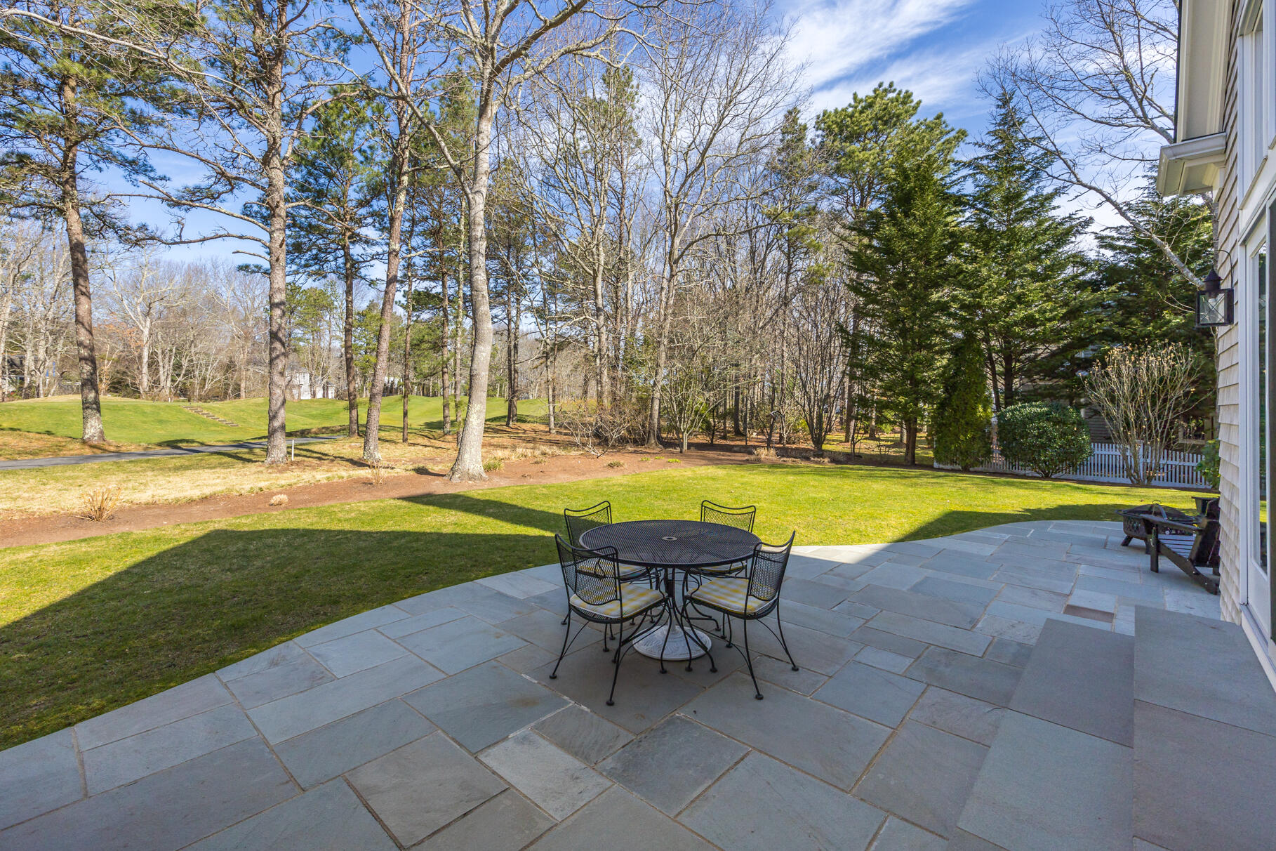 40 Reflection Drive Sandwich, MA 02563 - Photo 58 of 59 a view of a swimming pool and sitting area with a slide