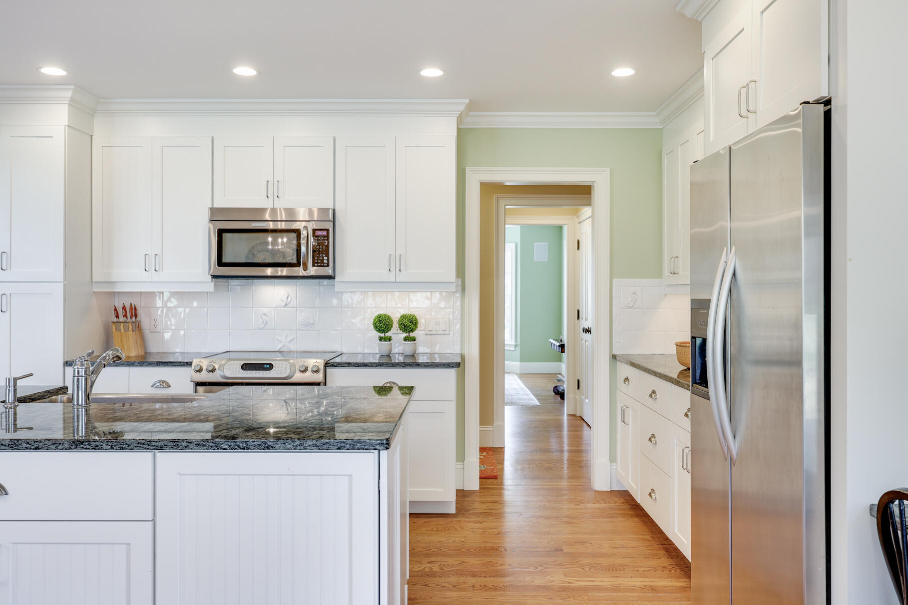 40 Reflection Drive Sandwich, MA 02563 - Photo 10 of 59 a kitchen with stainless steel appliances granite countertop a refrigerator a stove and a sink