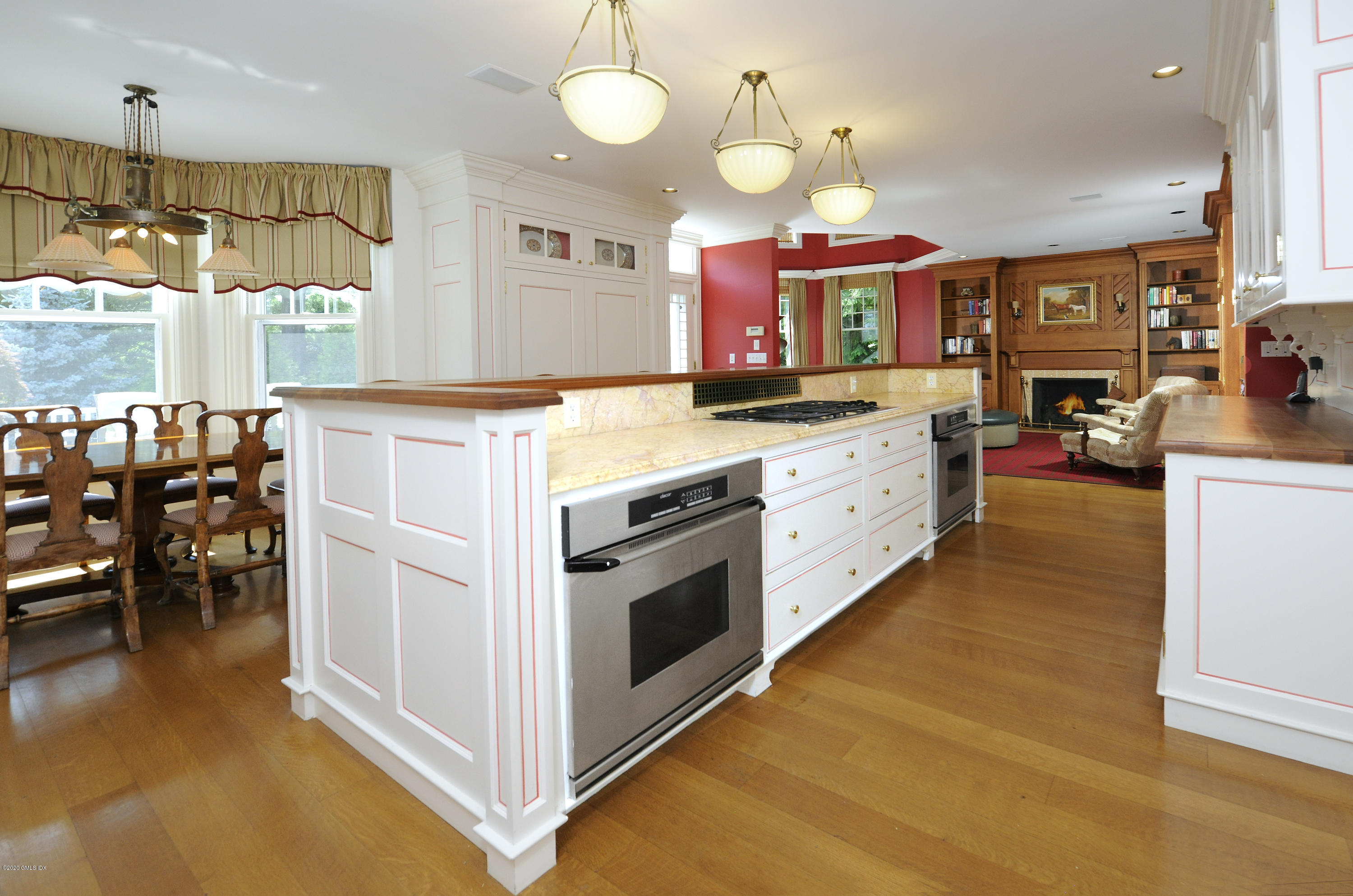 134 Otter Rock Drive Greenwich, CT 06830 - Photo 11 of 25 a kitchen with cabinets and window