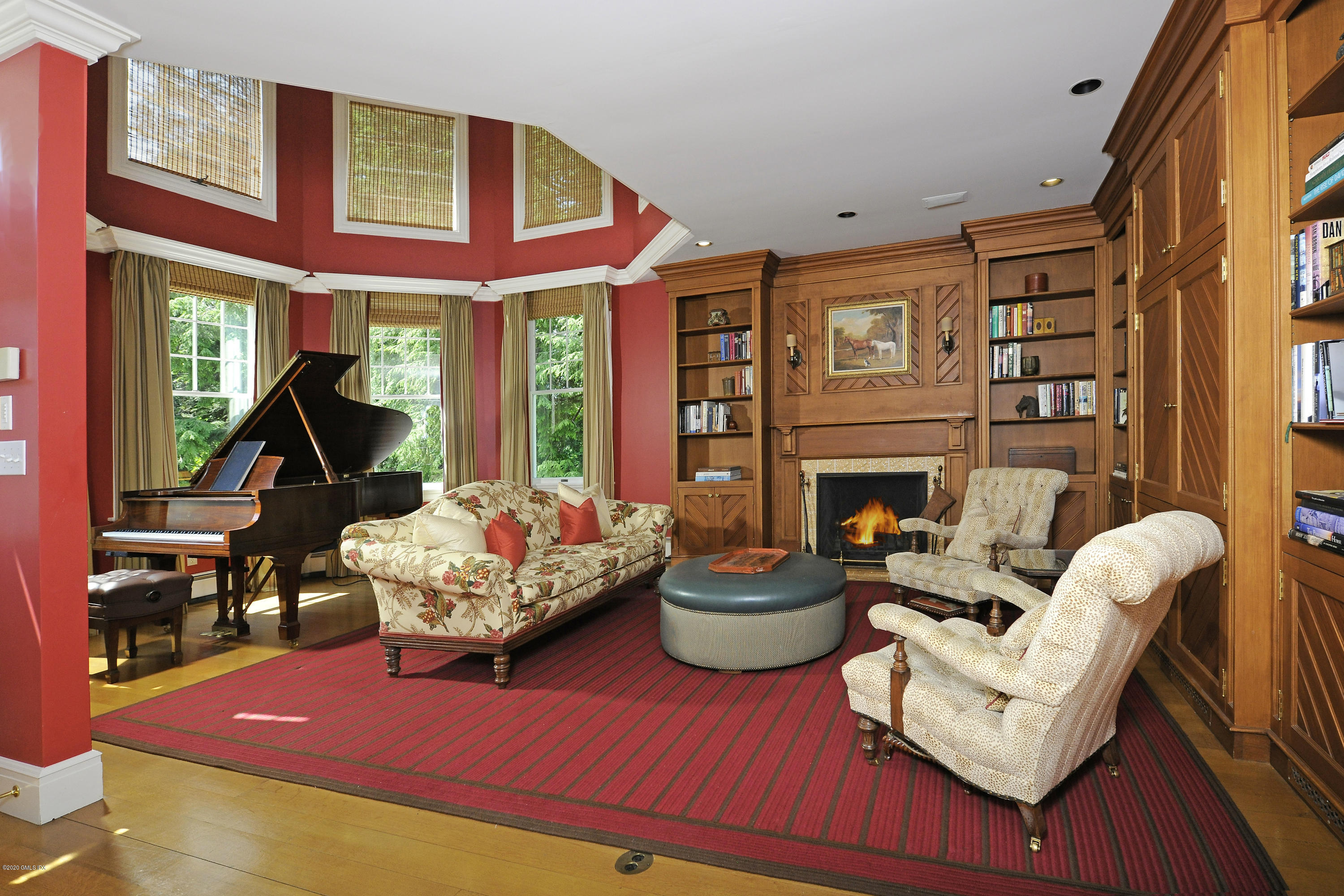 134 Otter Rock Drive Greenwich, CT 06830 - Photo 12 of 25 a living room with furniture fireplace and flat screen tv