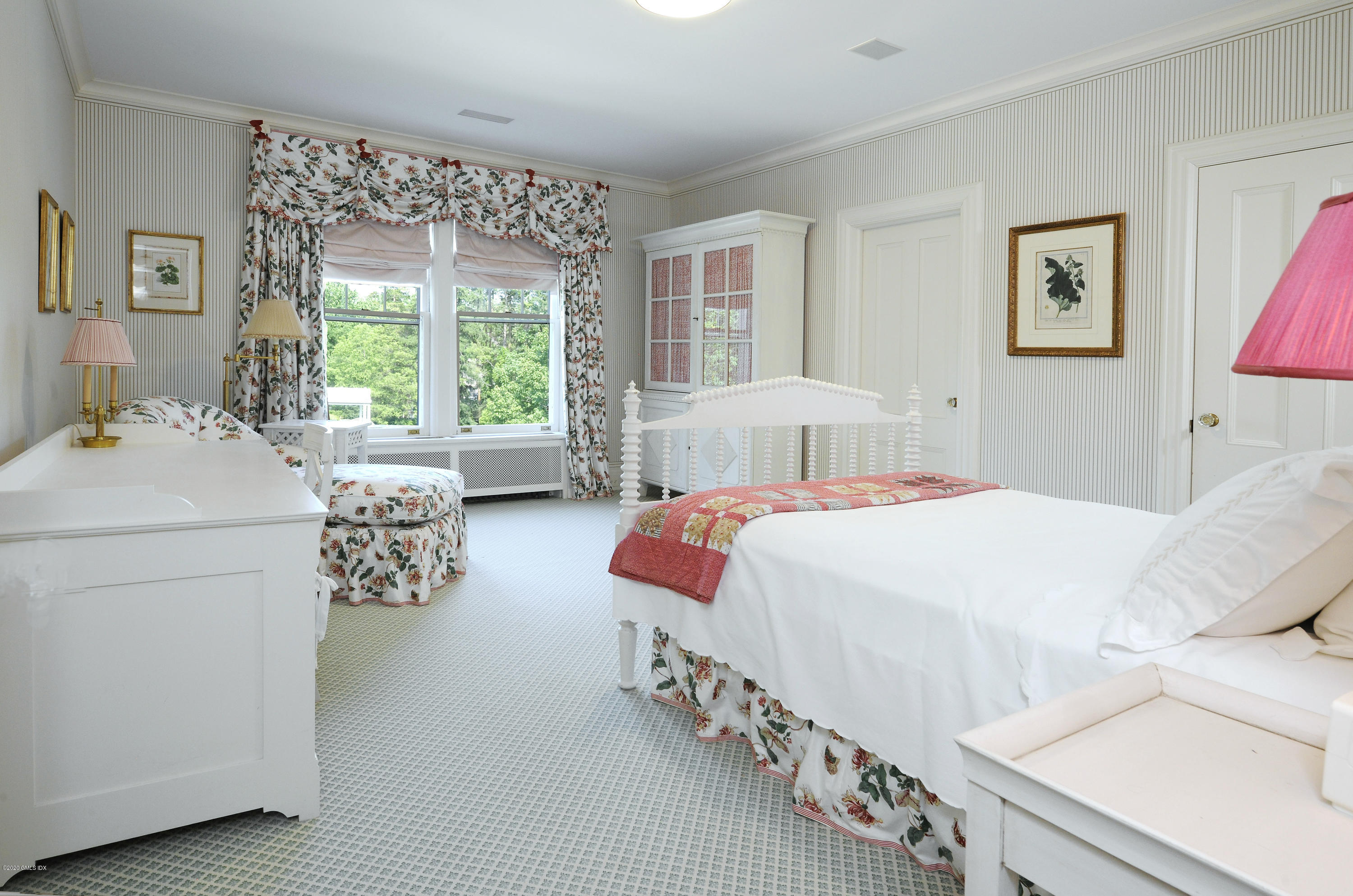 134 Otter Rock Drive Greenwich, CT 06830 - Photo 16 of 25 a bedroom with bed and window