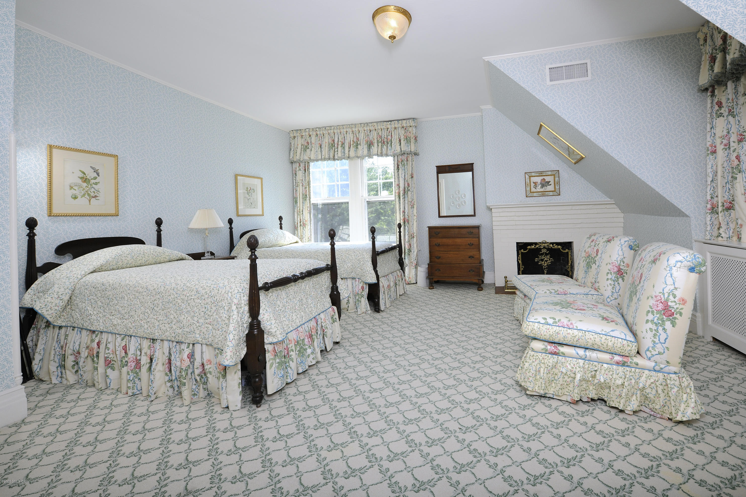 134 Otter Rock Drive Greenwich, CT 06830 - Photo 18 of 25 a living room with furniture and a fireplace
