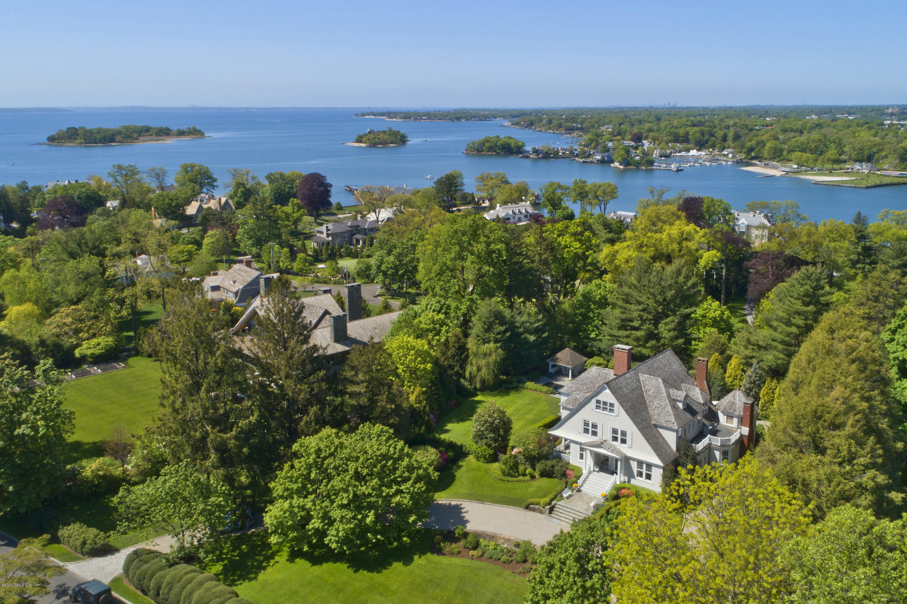 134 Otter Rock Drive Greenwich, CT 06830 - Photo 2 of 25 an aerial view of a houses with a lake view