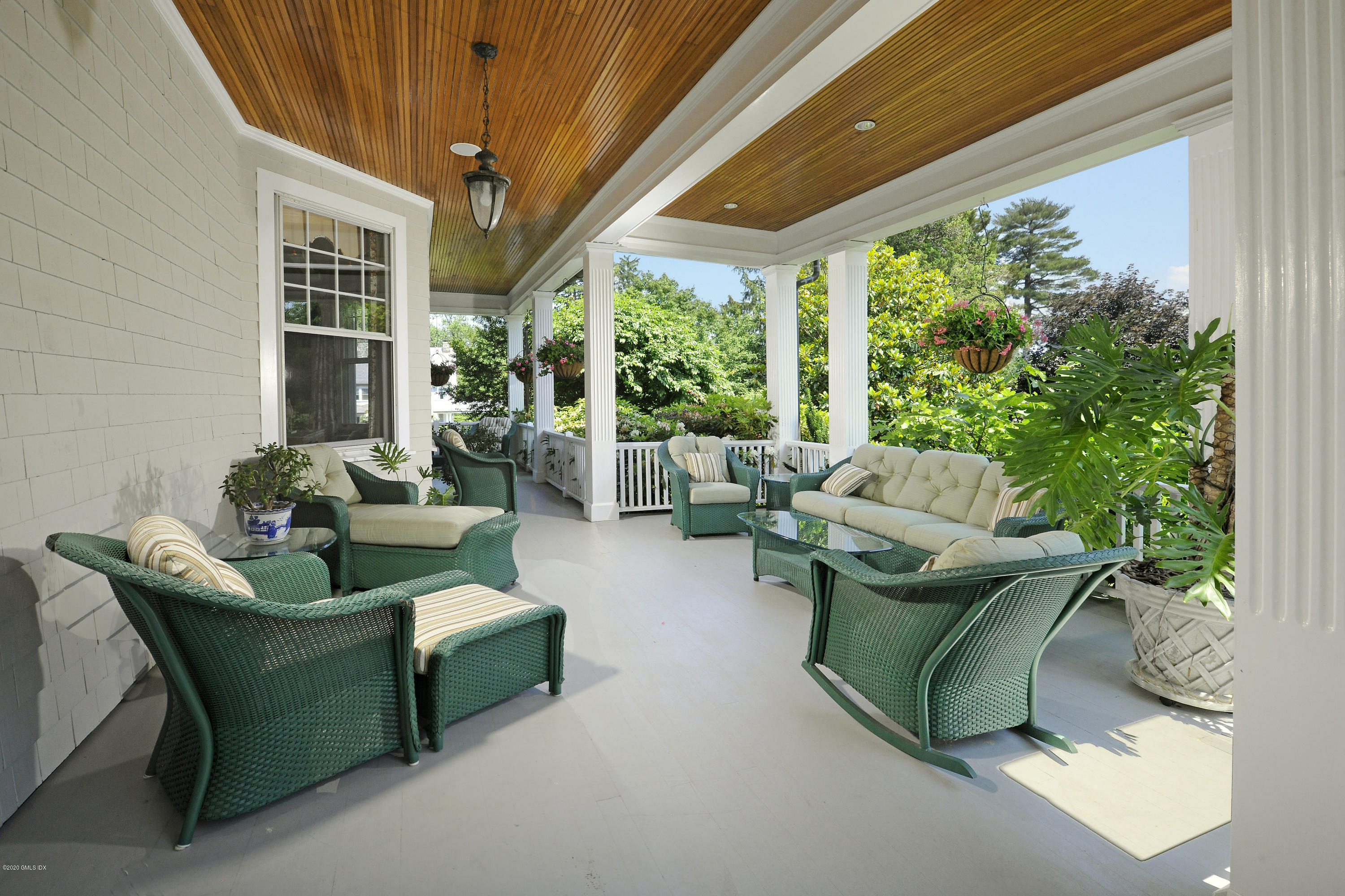 134 Otter Rock Drive Greenwich, CT 06830 - Photo 21 of 25 a living room with furniture and a large window