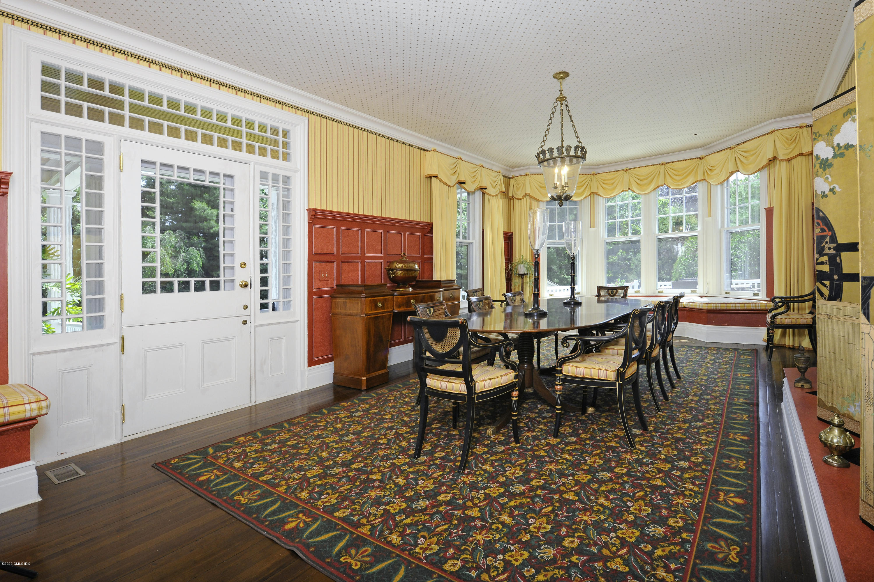 134 Otter Rock Drive Greenwich, CT 06830 - Photo 10 of 25 a view of a dining room with furniture window and outside view