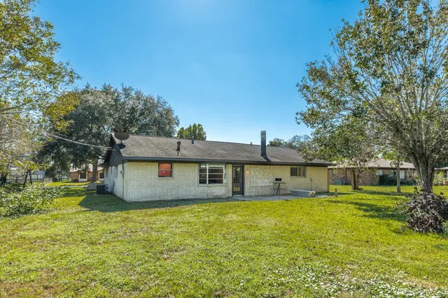 a front view of house with an outdoor space and balcony