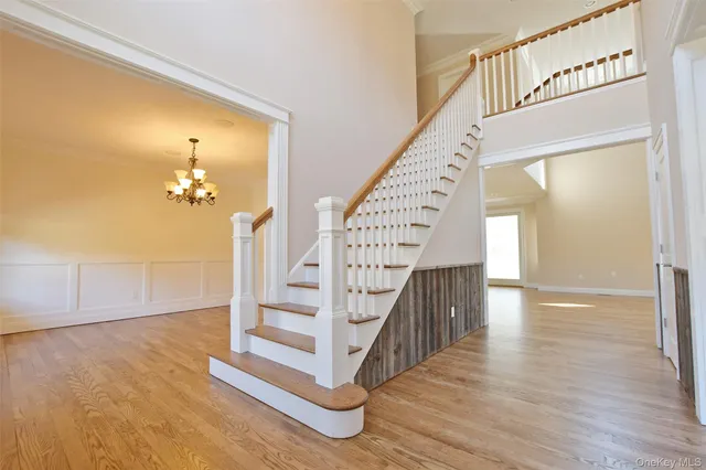 a view of entryway with wooden floor