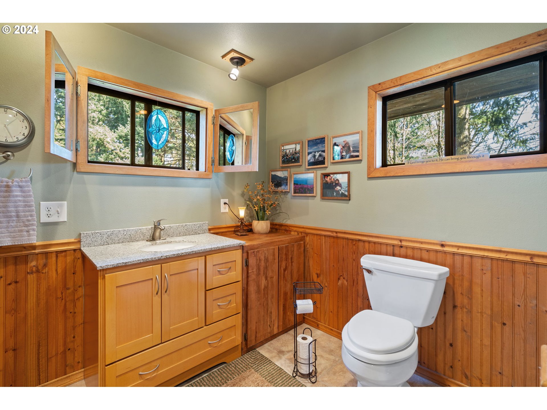 16441 South Henrici Road Oregon City, OR 97045 - Photo 13 of 41 a bathroom with a granite countertop toilet sink and mirror