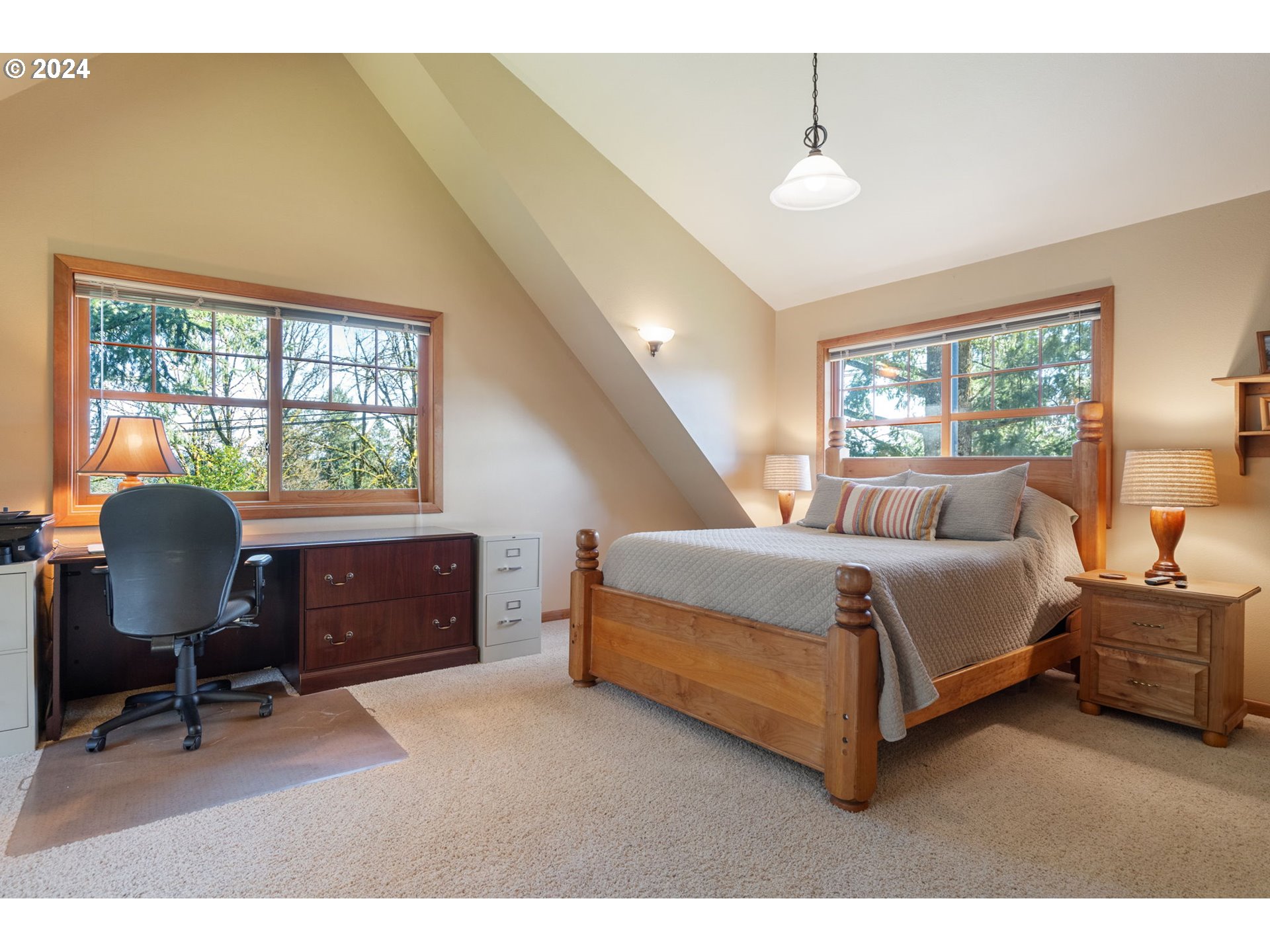 16441 South Henrici Road Oregon City, OR 97045 - Photo 18 of 41 a bedroom with a bed chair and a window