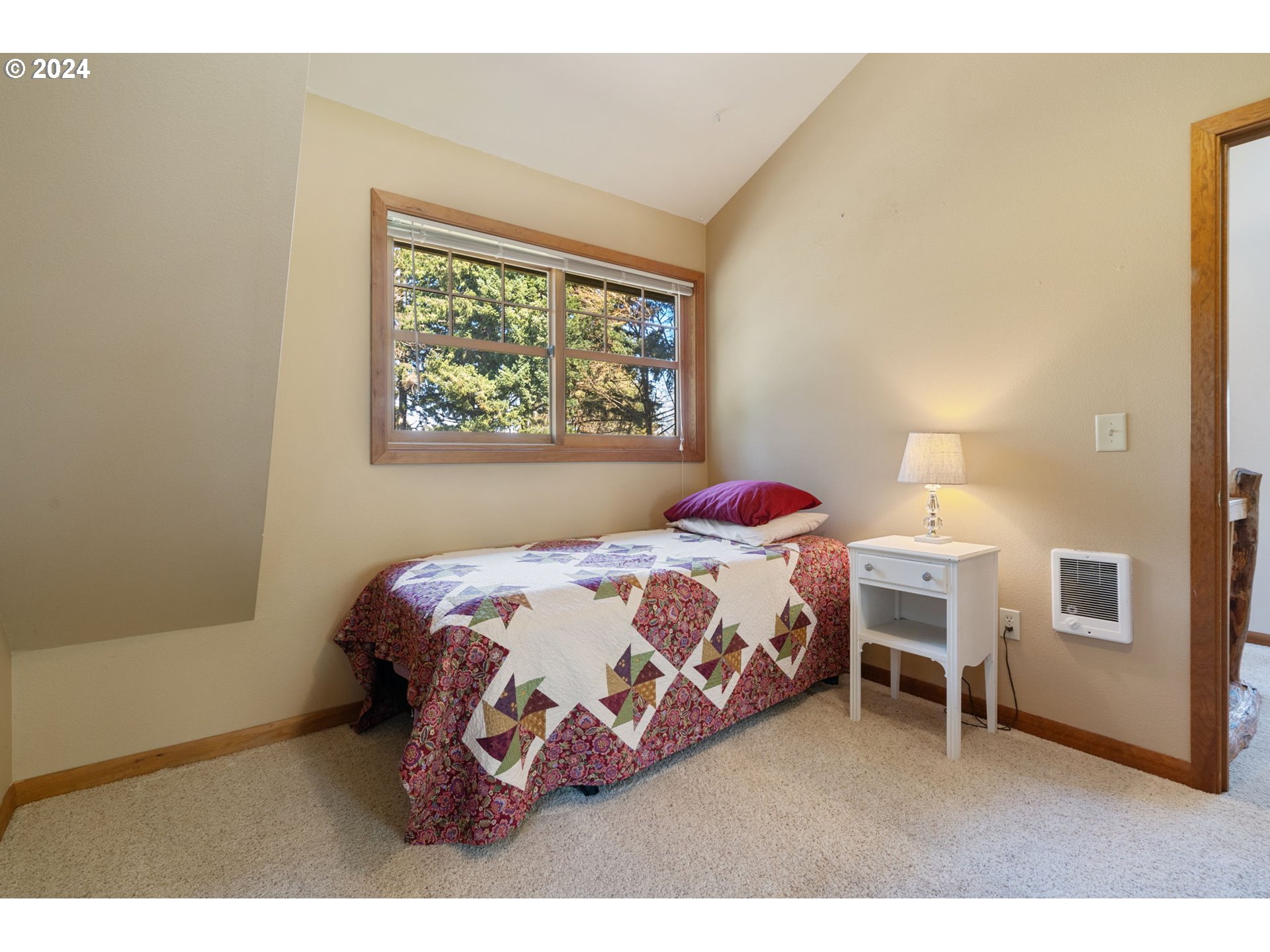 16441 South Henrici Road Oregon City, OR 97045 - Photo 20 of 41 a bedroom with a bed and a window