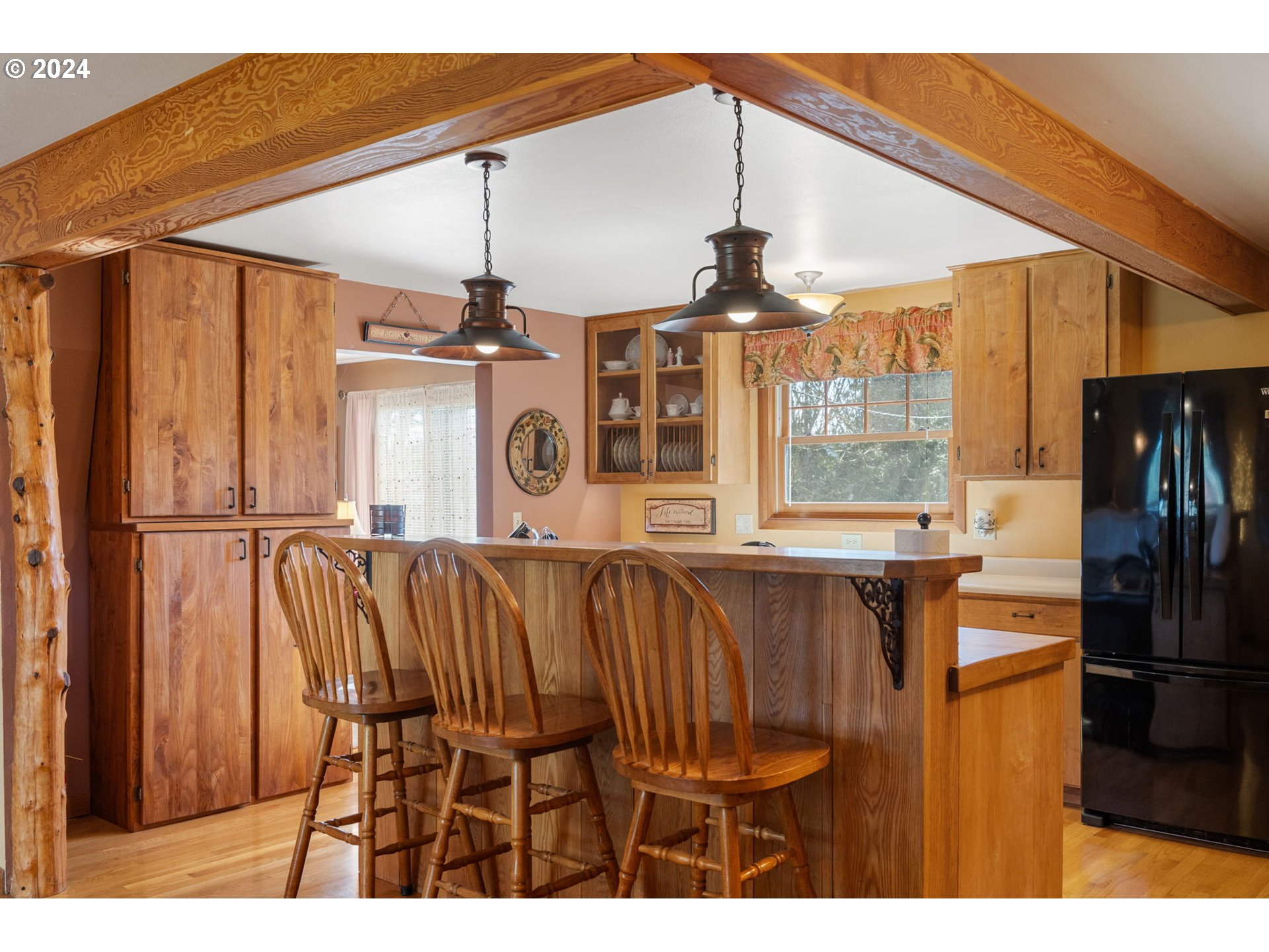 16441 South Henrici Road Oregon City, OR 97045 - Photo 6 of 41 a view of a kitchen with furniture and window