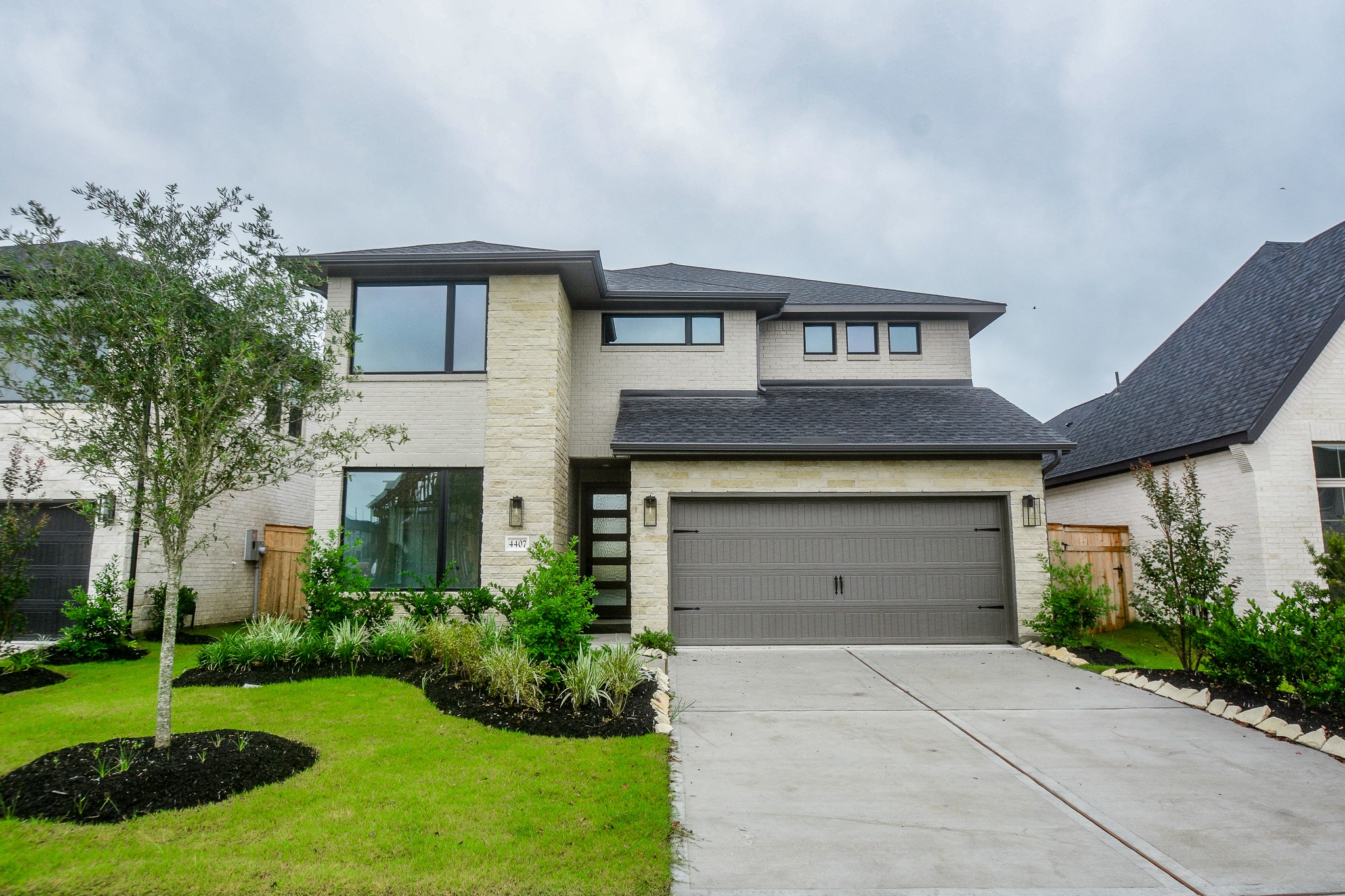 4407 Ruby Gdn Court Fulshear, TX 77441 - Photo 2 of 32 Welcoming exterior with spacious two-car garage