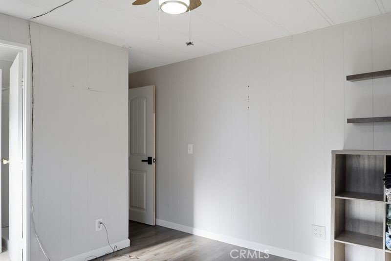 34164 Harrow Hill Road Wildomar, CA 92595 - Photo 18 of 60 a view of hallway with wooden floor