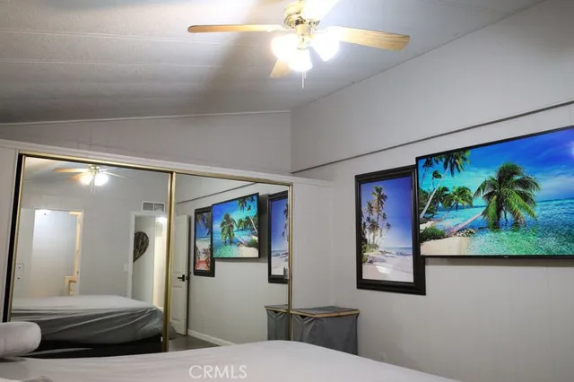 a view of a patio with a table and chairs and wooden floor