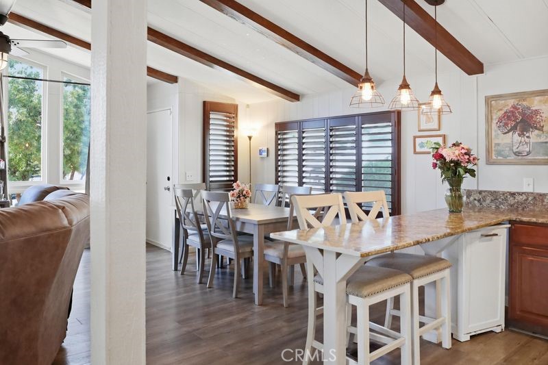 34164 Harrow Hill Road Wildomar, CA 92595 - Photo 4 of 60 a view of a dining room with furniture window and outside view
