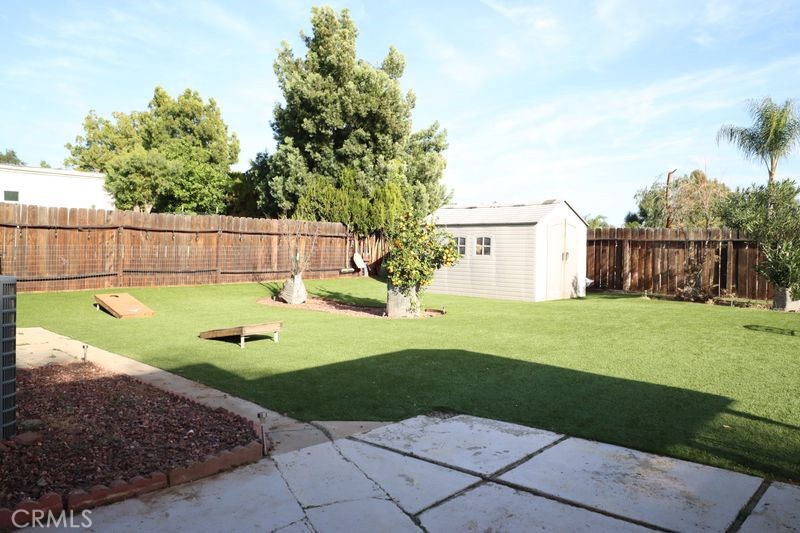 34164 Harrow Hill Road Wildomar, CA 92595 - Photo 41 of 60 a view of a backyard with a garden and plants