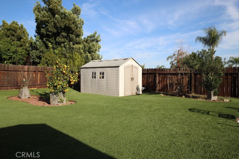 34164 Harrow Hill Road Wildomar, CA 92595 - Photo 56 of 60 a view of a house with backyard and garden