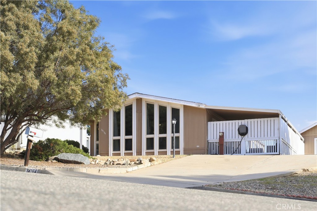 34164 Harrow Hill Road Wildomar, CA 92595 - Photo 57 of 60 a front view of house with yard
