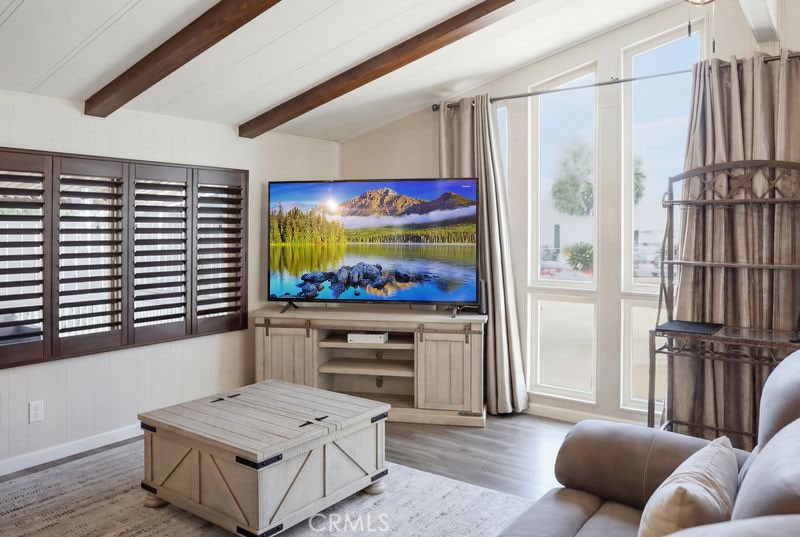34164 Harrow Hill Road Wildomar, CA 92595 - Photo 10 of 60 a living room with furniture and a flat screen tv