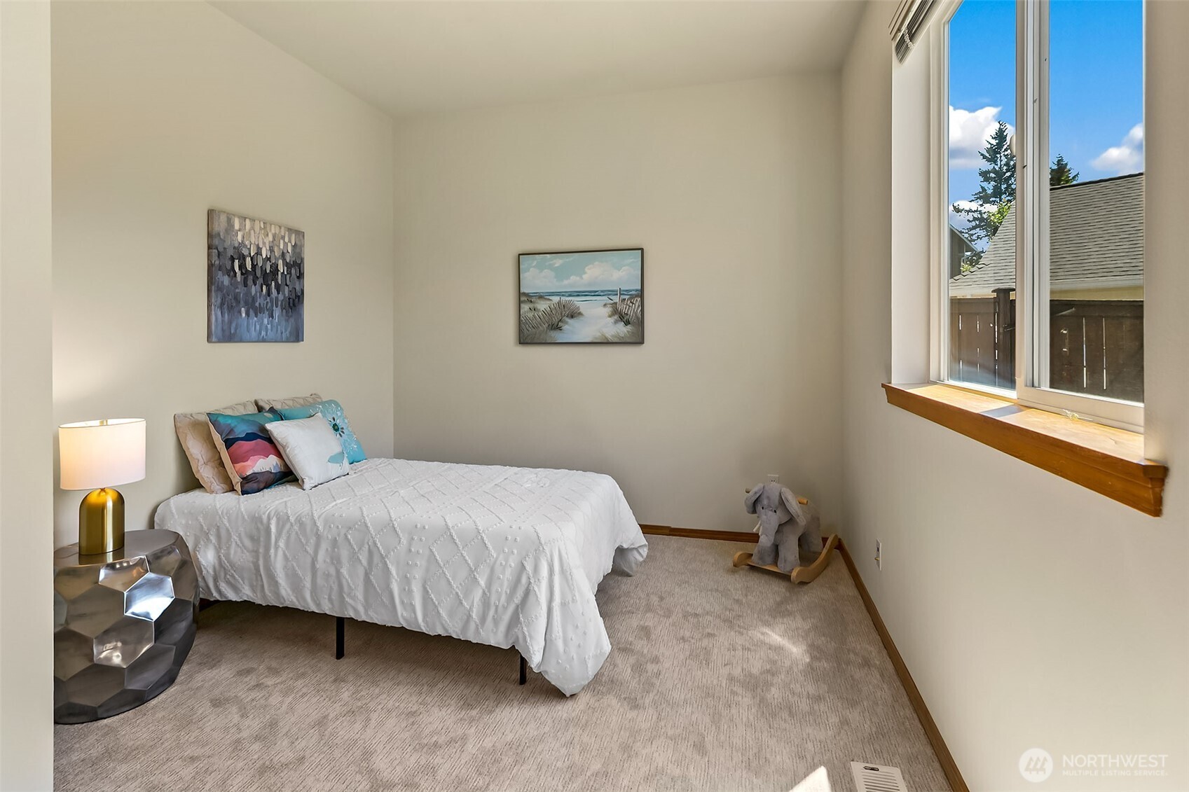 20604 Damson Road Lynnwood, WA 98036 - Photo 16 of 24 a bedroom with a bed and a window