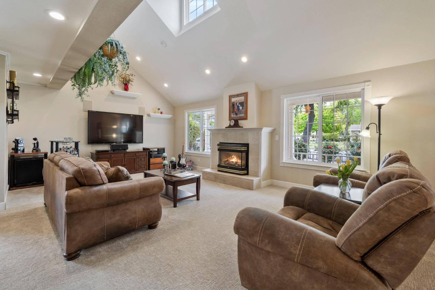 261 Cherry Lane Campbell, CA 95008 - Photo 12 of 49 a living room with furniture fireplace and a flat screen tv