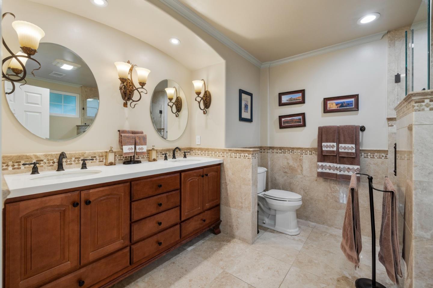 261 Cherry Lane Campbell, CA 95008 - Photo 16 of 49 a spacious bathroom with a double vanity sink toilet and a mirror